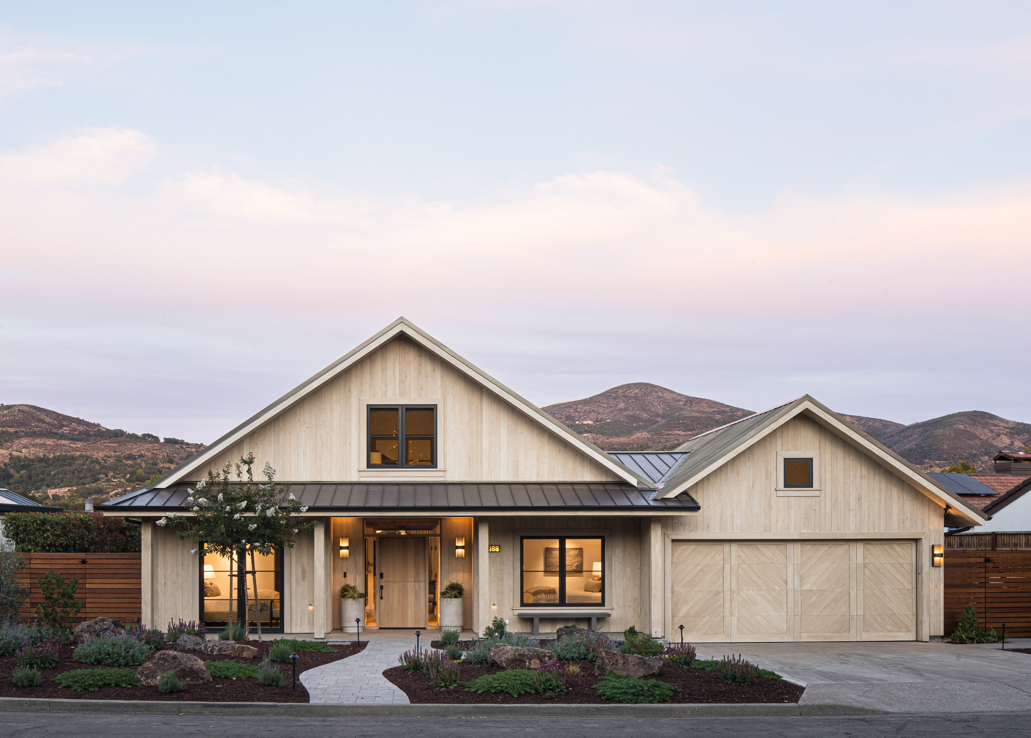 Warm colors, black trim and beams are in